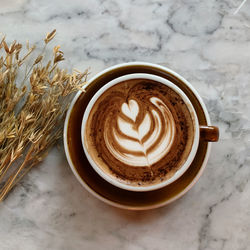 High angle view of coffee on table