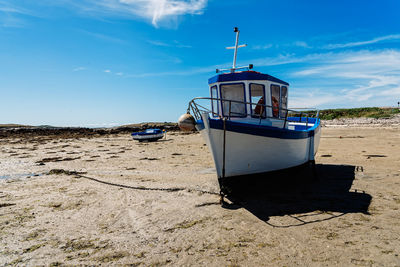 Stranded ships at low tide in the beach. kervenni in pointe du castel ach. sunny day of summer