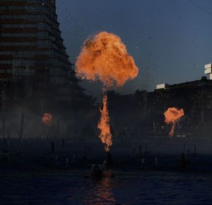 View of burning fire against sky during night