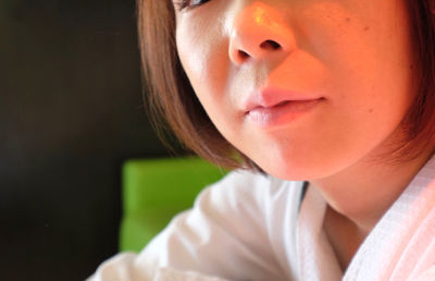 Close-up portrait of a young woman