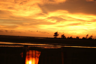 Scenic view of sea at sunset