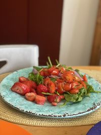 Close-up of strawberries in plate on table