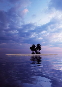 Silhouette trees by sea against sky during sunset