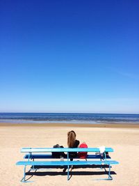 Scenic view of beach against clear sky