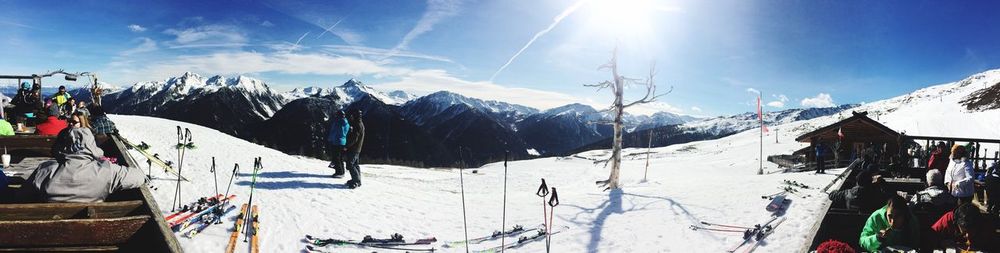 Panoramic view of snowcapped mountains against sky