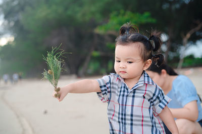 Cute girl enjoying on land