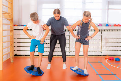 Balance exercises for children, using balancing disks