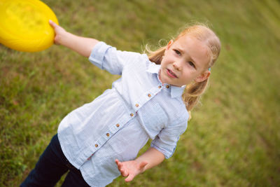 Crying girl standing outdoors