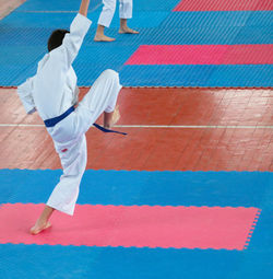 Rear view of man practicing martial arts