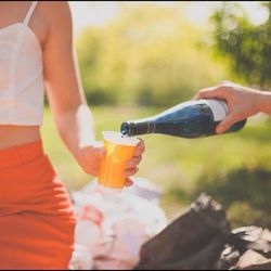 Cropped image of hand holding outdoors