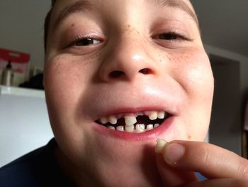 Close-up portrait of smiling boy