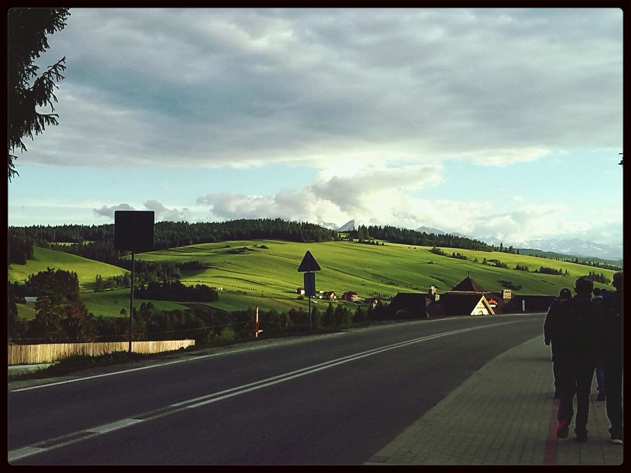 road, transfer print, sky, transportation, road marking, cloud - sky, the way forward, cloudy, auto post production filter, cloud, street, diminishing perspective, land vehicle, car, vanishing point, country road, men, day, outdoors