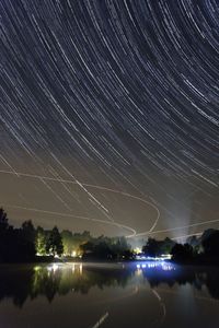 Star trails over dark background