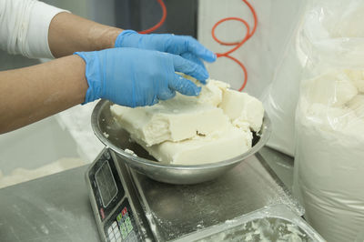 Close-up of hand holding ice cream