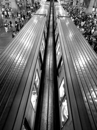 High angle view of people on escalator in city