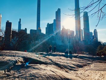 Panoramic view of city buildings against sky