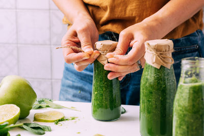 Midsection of man preparing food