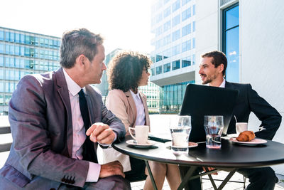 Business colleagues working at office