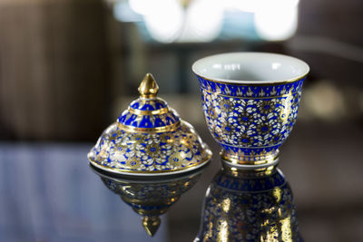 Close-up of tea cup on table