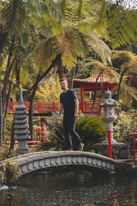 Adventurer walks through the monte palace madeira botanical garden in funchal, of portuguese island