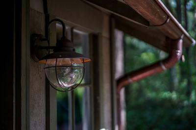 Close-up of lighting equipment hanging outdoors