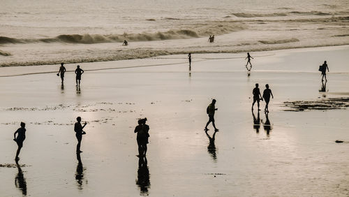 People standing on beach