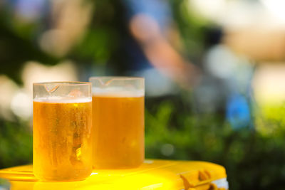 Close-up of beer in glass on table