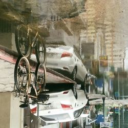 Close-up of car parked against building