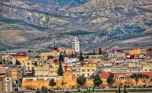 Aerial view of townscape and mountains