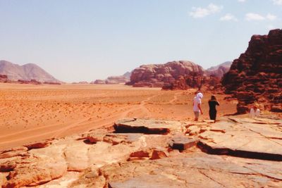 Man standing on rock formation