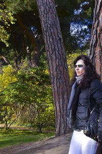 Portrait of young woman in forest