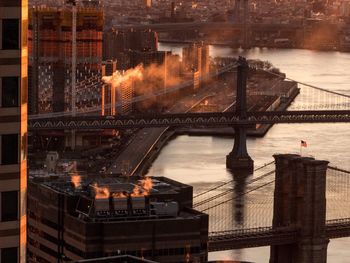 Cityscape against sky during sunset