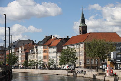 Buildings in city against sky