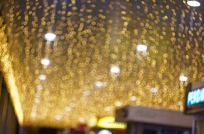 Low angle view of illuminated light bulb