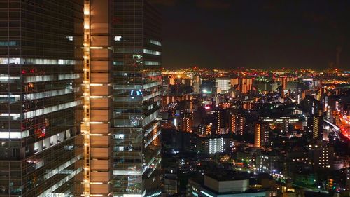 Illuminated cityscape at night