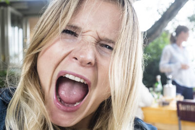 Close-up of a woman shouting