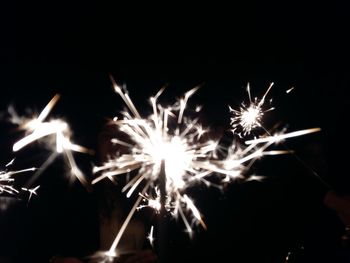 Firework display at night