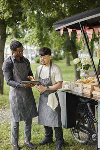 Men at food stall