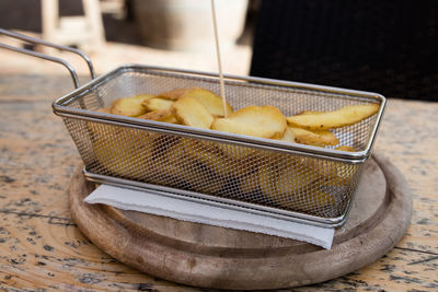 Close-up of potatoes in plate on table