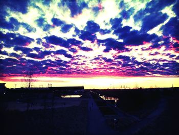 Scenic view of dramatic sky during sunset