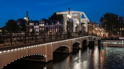 Bridge over river at night