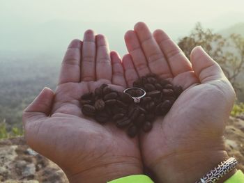 Close-up of person holding hands