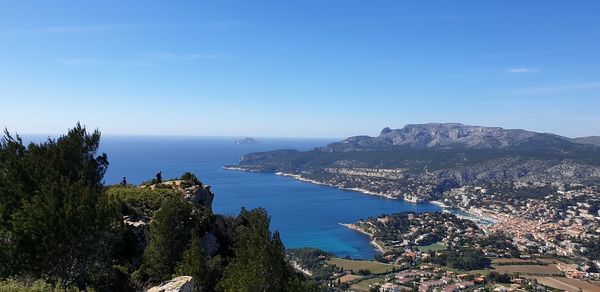 High angle view of bay against clear blue sky