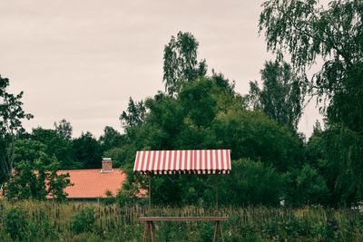 House on field against sky