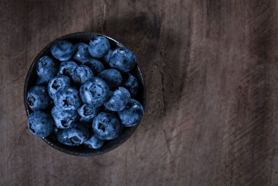 High angle view of fruits in plate on table