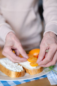Midsection of chef preparing food
