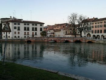 River by city against clear sky