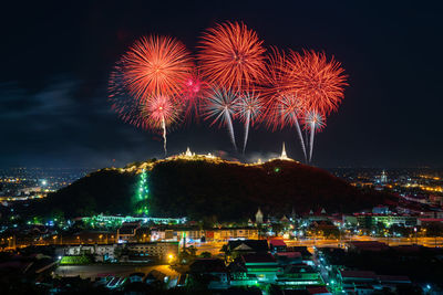 Firework display at night