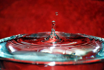 Close-up of drop splashing in water