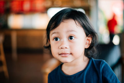 Portrait of cute baby at home